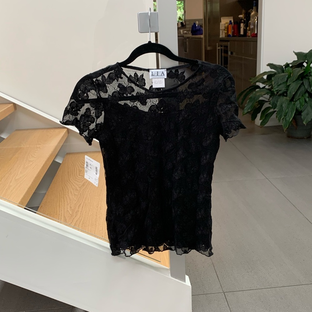Women's NWT black lace top.